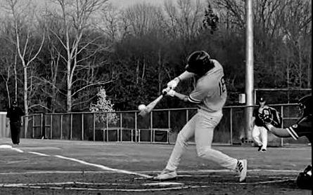 Cade Williams drives the ball for a triple.