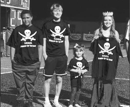 The trait for this game is relentless. These students were selected to represent their sites for demonstrating this trait. From left, Xzavon Cole, Collins Elementary, Braylon Freeman, Bristow Middle School; Tatum Lane, Edison Elementaryn Macy Peters, Bristow High School.