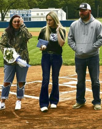 Laramie Fenton (team manager) with parents April and Cole Fenton.