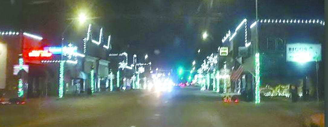 Both sides of Main Street are glowing with Christmas lights. Almost every businesses was glowng with lights and picutres of western decor in their windows. A welcoming and pleasurable sight for the community and people traveling through town, especially at night.
