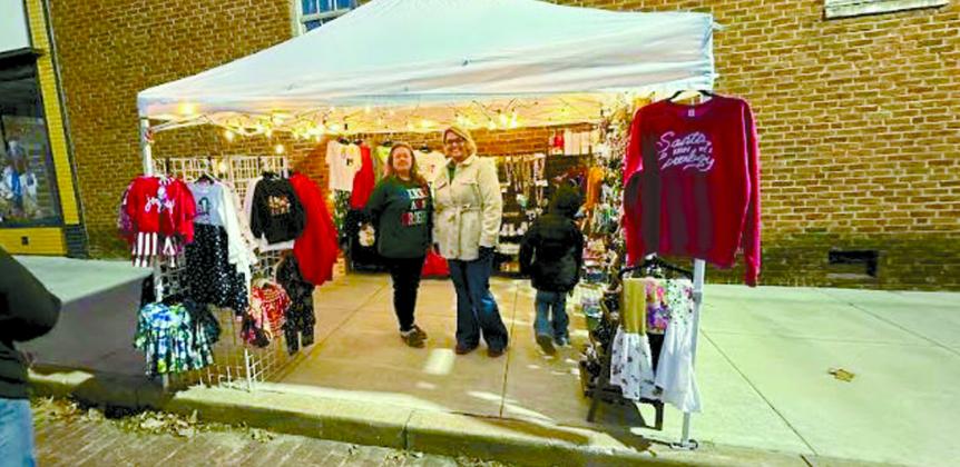 Vendors set up around the community Christmas tree, at 8th and Main, during the Cowboy Christmas Parade, to offer unique gift ideas.