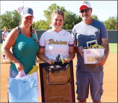 Tucker Grant with parents Jai Webb and Billy Grant.