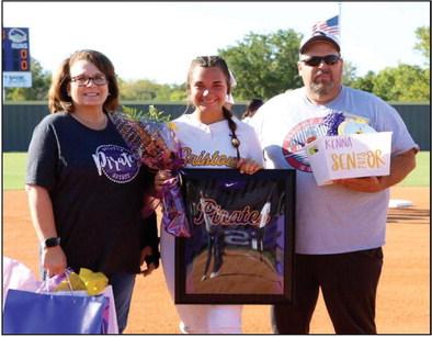 Makenna Ingram with parents Becky and Mark Ingram.