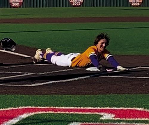 Jaxon Crouch slides safely into home..