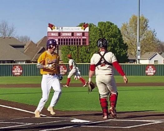 Hayden Yocham scores a run.