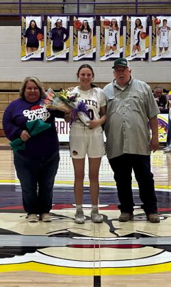 Allie Brewer with parents Brad and Tina Brewer (basketball and cheer).