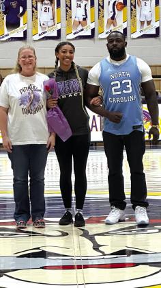Makenzie Spencer-Friday with parents Alysa Ernst and Dominic Spencer-Friday (track and basketball trainer).