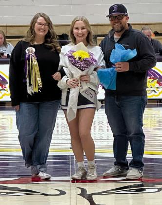 Pyper Daniels with parents Dustin and Destiny Daniels (cheer).