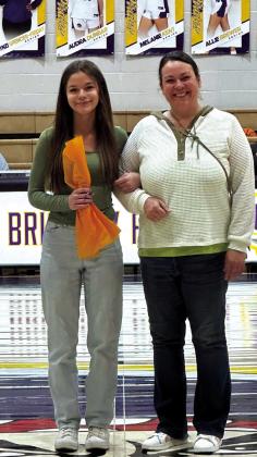 Cassidy Hicks with mother Jade Hicks (track).