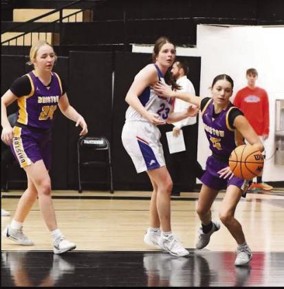 Abby Morgan and Shalyn Edmondson go for the ball.