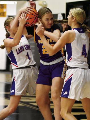 Olivia Morgan hangs on to the ball.