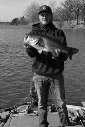 John McMurray with a largemouth bass caught at Veterans Lake. courtesy photo