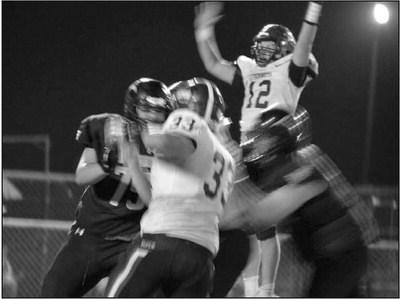 Warner Vanorsdol and Tyler Burdick make a block.