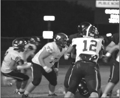 James Lindley, Christopher White, Tyler Burdick and Brick McDaniel rush the opponent.