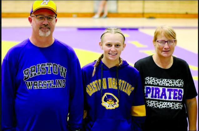 Zoey Freeman with parents Raymond Freeman and Carla Freeman.