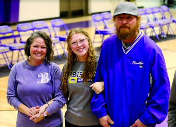 Lillie Russell with parents Stephanie Deshazo and Tony Russell.