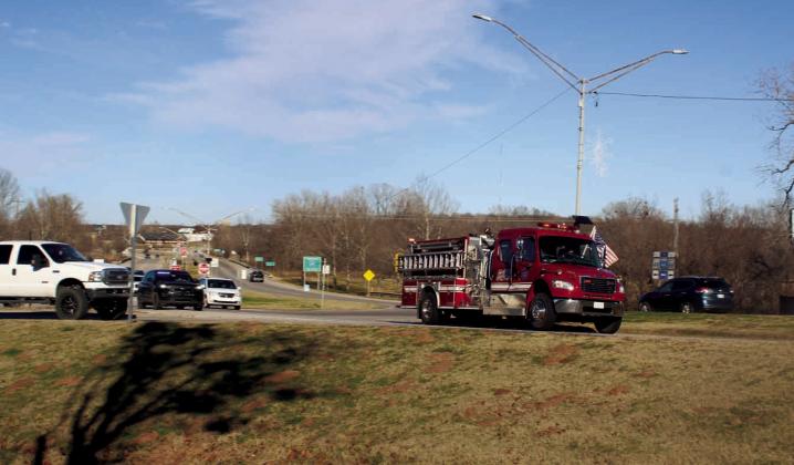 The Bristow Police Department and Bristow Fire Department joined together to pay tribute to Bob Grant. Grant was fire chief in Bristow for many years. Grant passed away the day after Christmas while in Arkansas. His remains were brought back to Bristow. Once arriving in Bristow, the van carrying his body was escorted through town and one last drive by the fire station was taken. Vicki Grisham photo