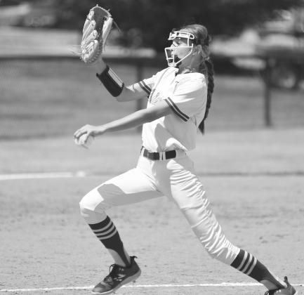 Left handed pitcher Tinslee Roberts makes a throw against McCloud.
