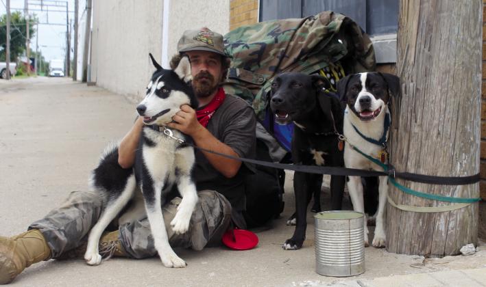 Texas Roadrunner travels with his companions, three canines, Crosstie, Abby and Marmaduke.
