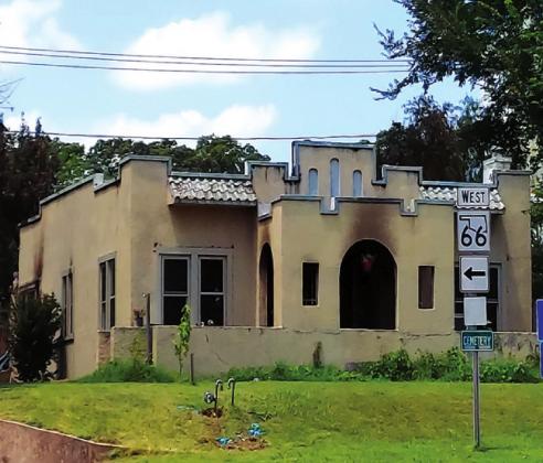 Historic home gutted by fire