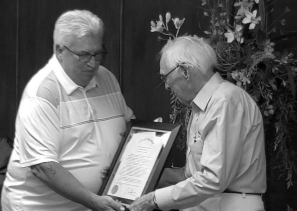 Mayor Rick Pinson presenting Mr. Krumme with the Proclamation naming him as Citizen of the Century. courtesy photo