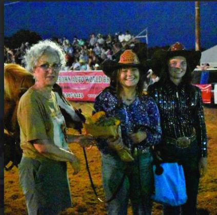 Mayor Kris Wyatt congradulates the 2023 Round Up Queen Cayden Keller, (center). courtesy photo