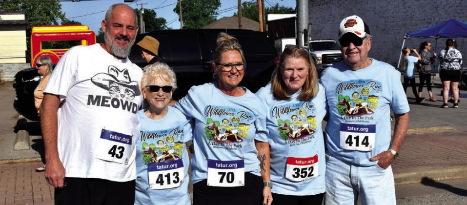 .From left, Kevin Chapman, Carolyn Webb, Wildflower Run honoree, Cathleen Chapman, Robin Sicks and Bob Webb, Wildflower Run honoree, ready to participae in the 5K run.
