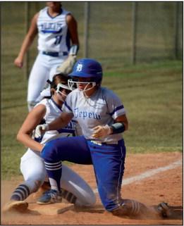 Cassie Halterman slides into third.