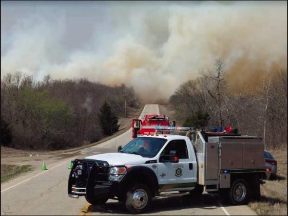 courtesy photo Firefighters kept busy over the weekend battling wildfires. Friday with gusts of wind over 50 miles an hour, it was tough on the firemen. This fire was on Highway 16 just past Shamrock, near Shaw Ranch.