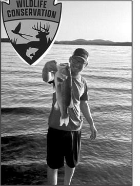 Kevyn Viana with a largemouth bass caught at Lawtonka Lake courtesy photo