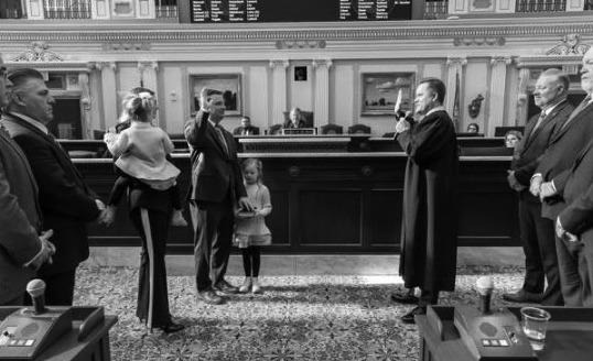 Rep. Kyle Hilbert is sworn in as Speaker of the House Jan. 7 with his family.