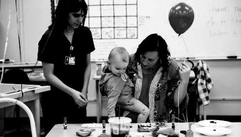 Advanced Health Careers Instructor, Brandi Fisher, interacted with a student and young supporter. courtesy photo