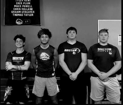 courtesy photo The Purple Pirate medalists at the Little Axe Powerlifting meet. From left, Denver Flood, Legend Johnson, Chris Doremus and Sawyer Campbell.