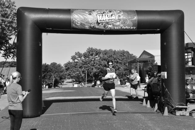 The first-place male finisher in the 5K was Will Hennum, age 23