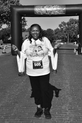 This year’s Wildflower Runs were dedicated to Toni Godwin, whose picture was put on the front of tee-shirts. She is the director of the Bristow's Social Services