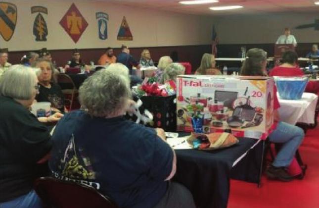 Members listen to speakers while attending District 8 meeting. courtesy photo