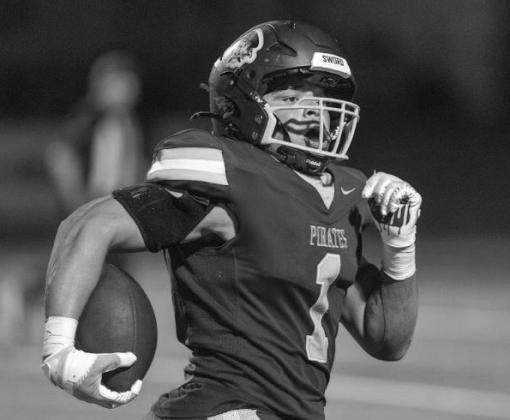 Darien Dansby carries the ball down the field.