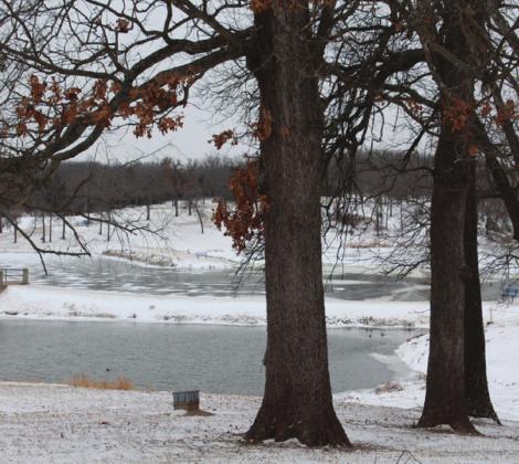 Lake Massena was frozen over as the frigid storm moved through the community, Sunday.