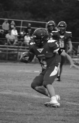 Jack Johnson runs the play.