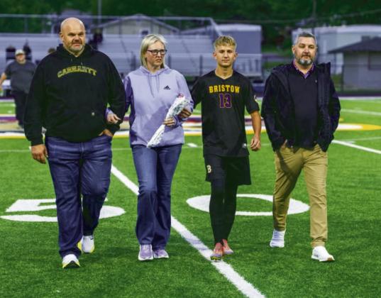 Zac Lane with Tim and Kendra Kent and Jason Lane.