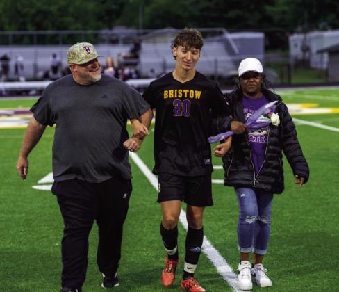 Seth Fortney with TIna Fortney and Coach Billy Sexton.