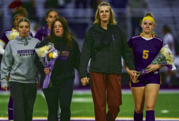 Claire and Libby Carter and Emaly Swigert being escorted by Meagan Vandecar.