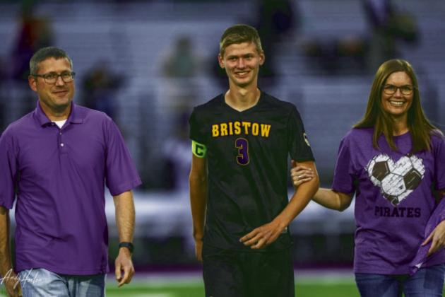 Carver Barnett escorted by Blake and Kristen Barnett
