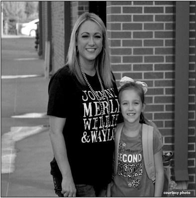 courtesy photo Olivia Sellers, second grade, parentswith mother Jolene Sellers