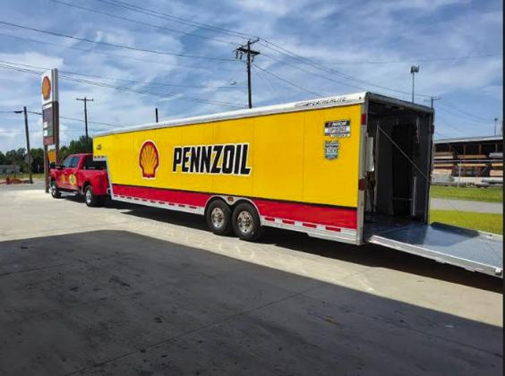 Debbie Tribble photo The Pennzoil Race Car was at DAK’s Market over the weekend. The car was trailered to the market and simulators were set up where you could try your luck at driving the car.
