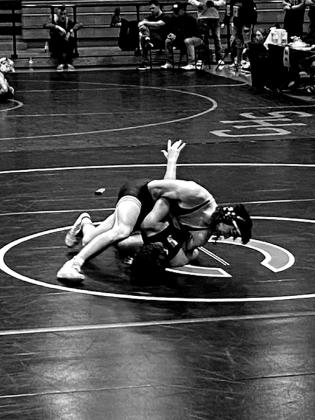 Chandler Fortney makes a take down maneuver. courtesy photo