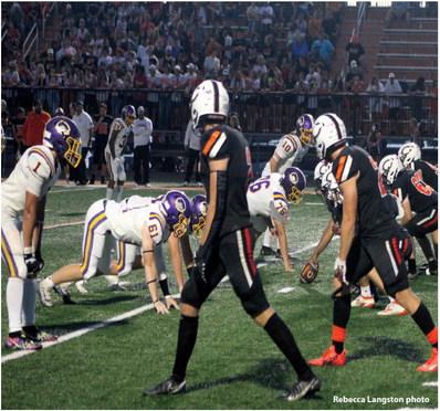 Rebecca Langston photo The Pirate defense holds the line against the Tigers.