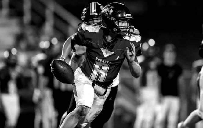 Braxdyn Swart takes the ball downfield.