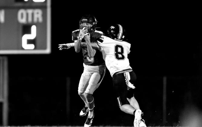 Wyatt Osburn makes the contested catch for a long gain