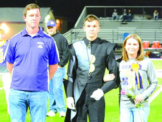 Gage Johnson with Jon and Tara Johnson